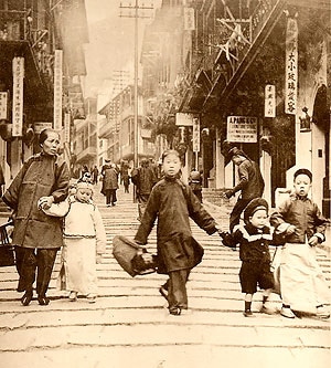 3 HK Pottinger Street1890s A Chinese family holding hands in the street