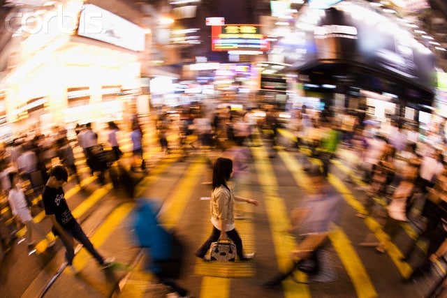 Pedestrians Crossing a Road in Central Hong Kong