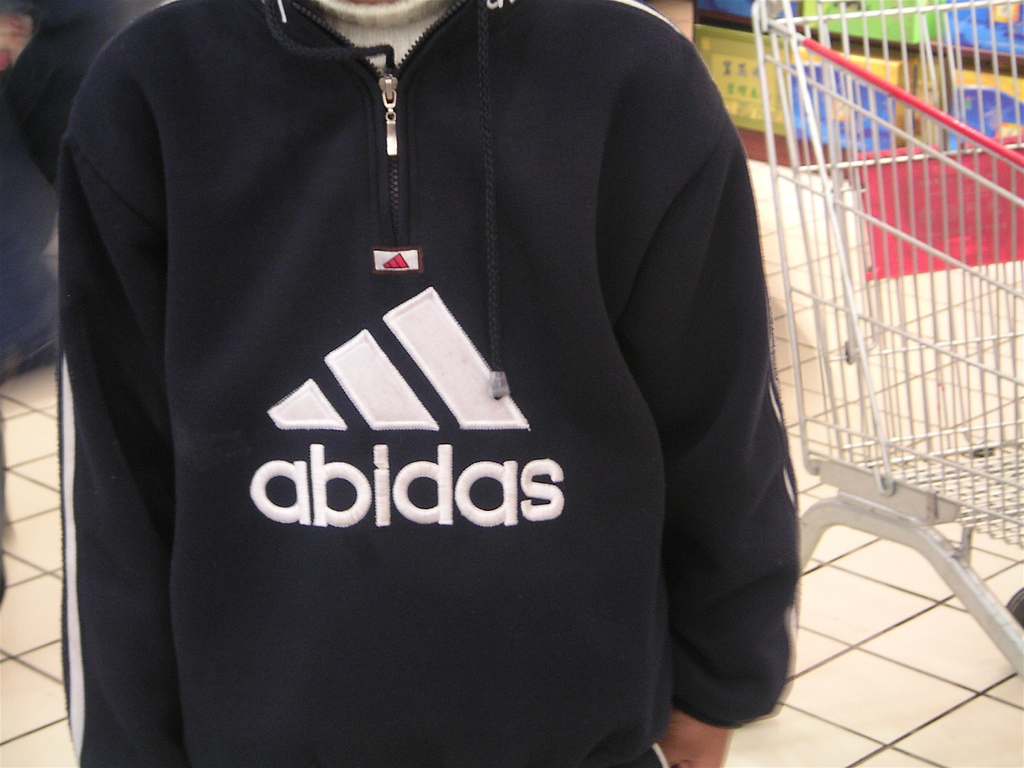 A fake Adidas sweatshirt in China that reads "abidas"