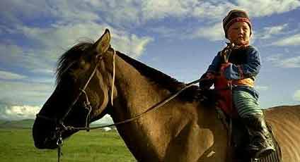 A child on horeseback