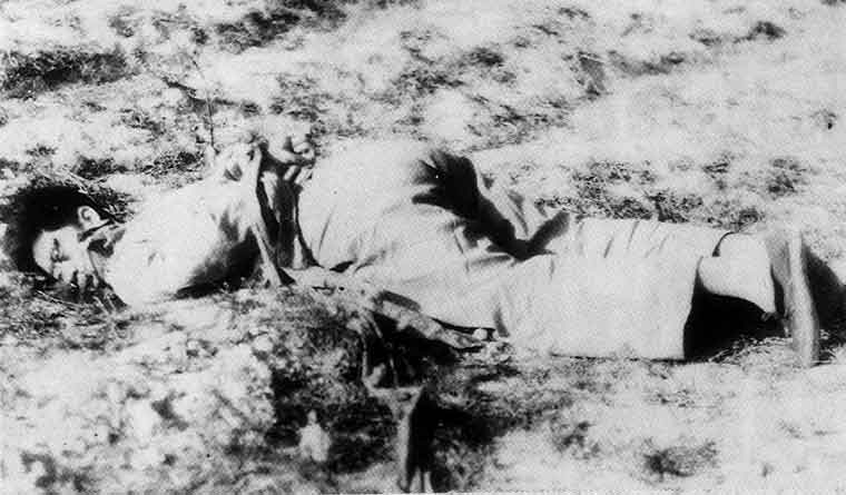 A dead Chinese body lying on the ground
